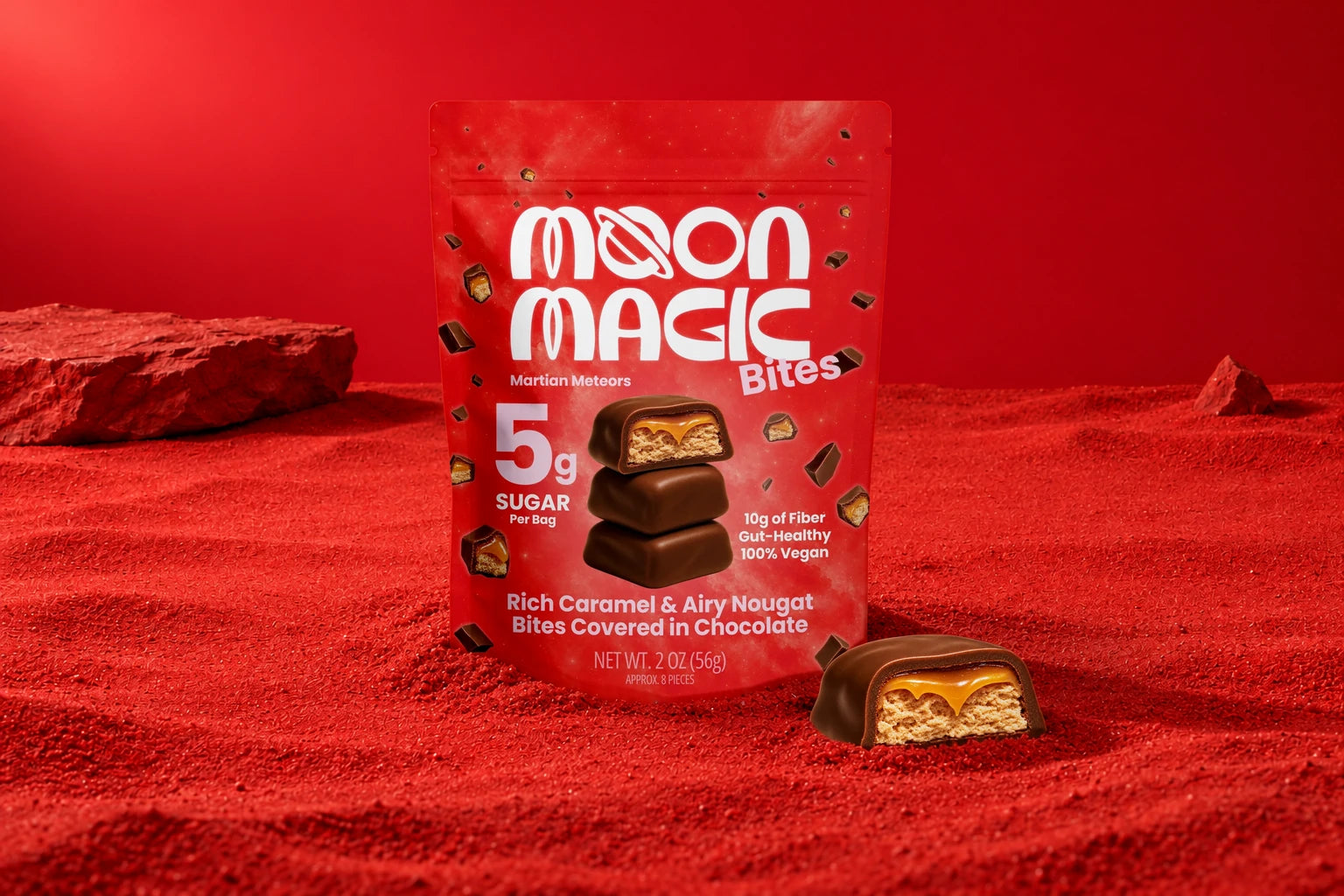 Moon Magic Martian Meteors bag and chocolate bite on a red background